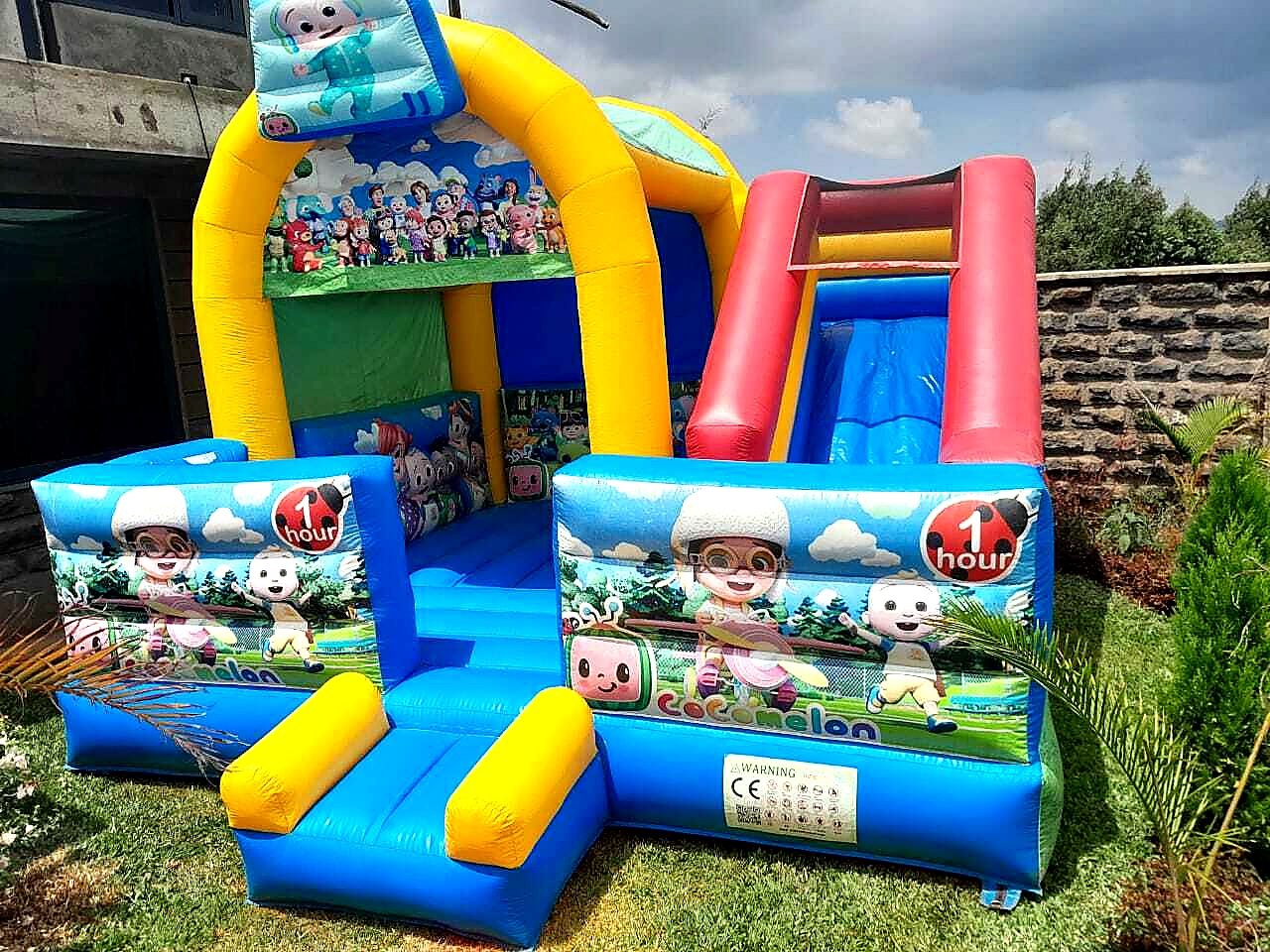 Cocomelon Bouncy House for hire at kids birthday party in Nairobi - view 3