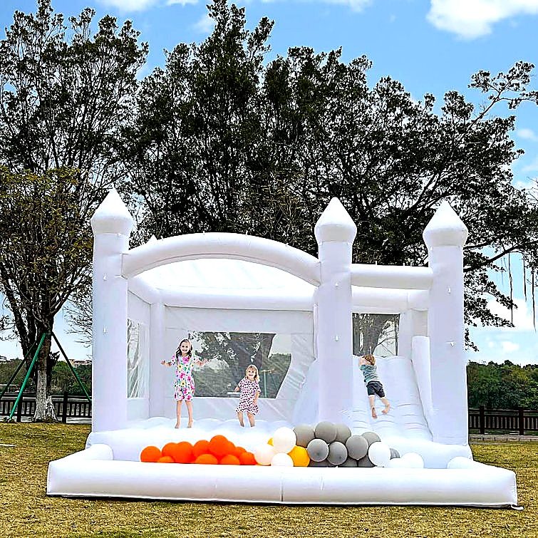 White Bouncing Castle with Balloons for hire at kids birthday party in Nairobi