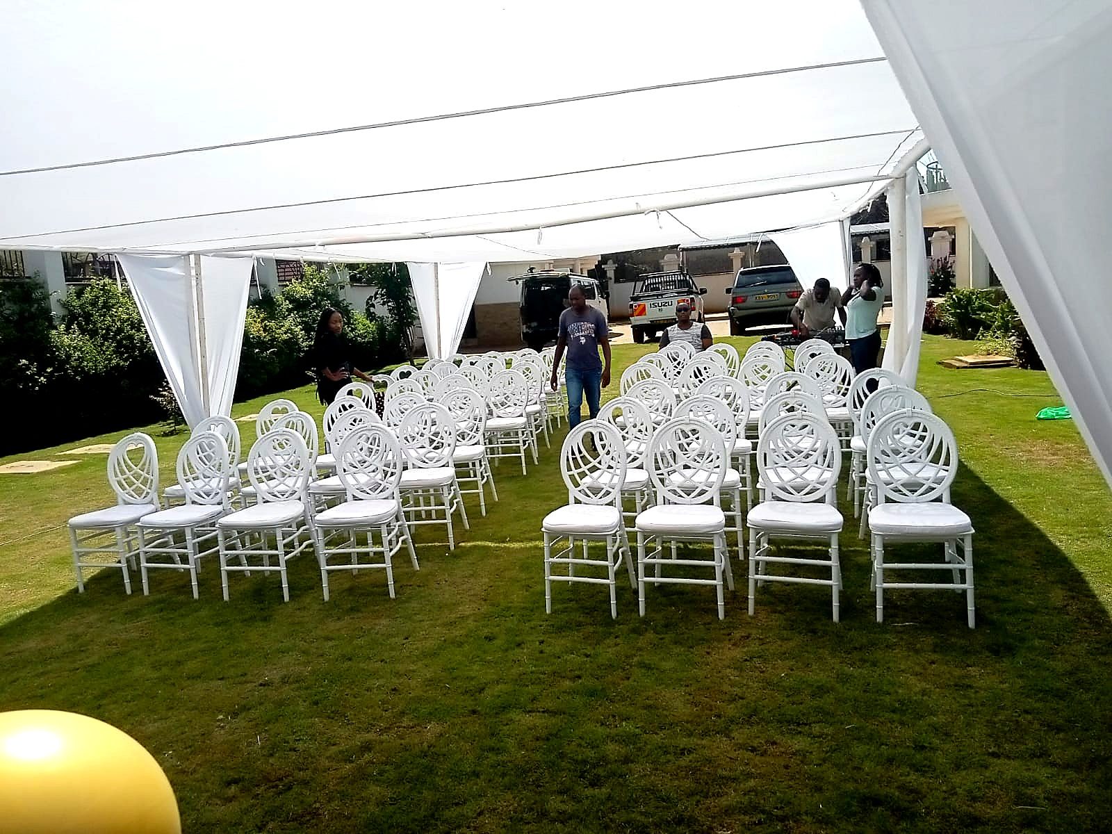 Rain-or-Shine Party Cover (with Sidewalls) shading a kids birthday party in Nairobi