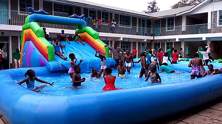 Gigantic Bouncy Water Slide for a kids summer pool party in Nairobi